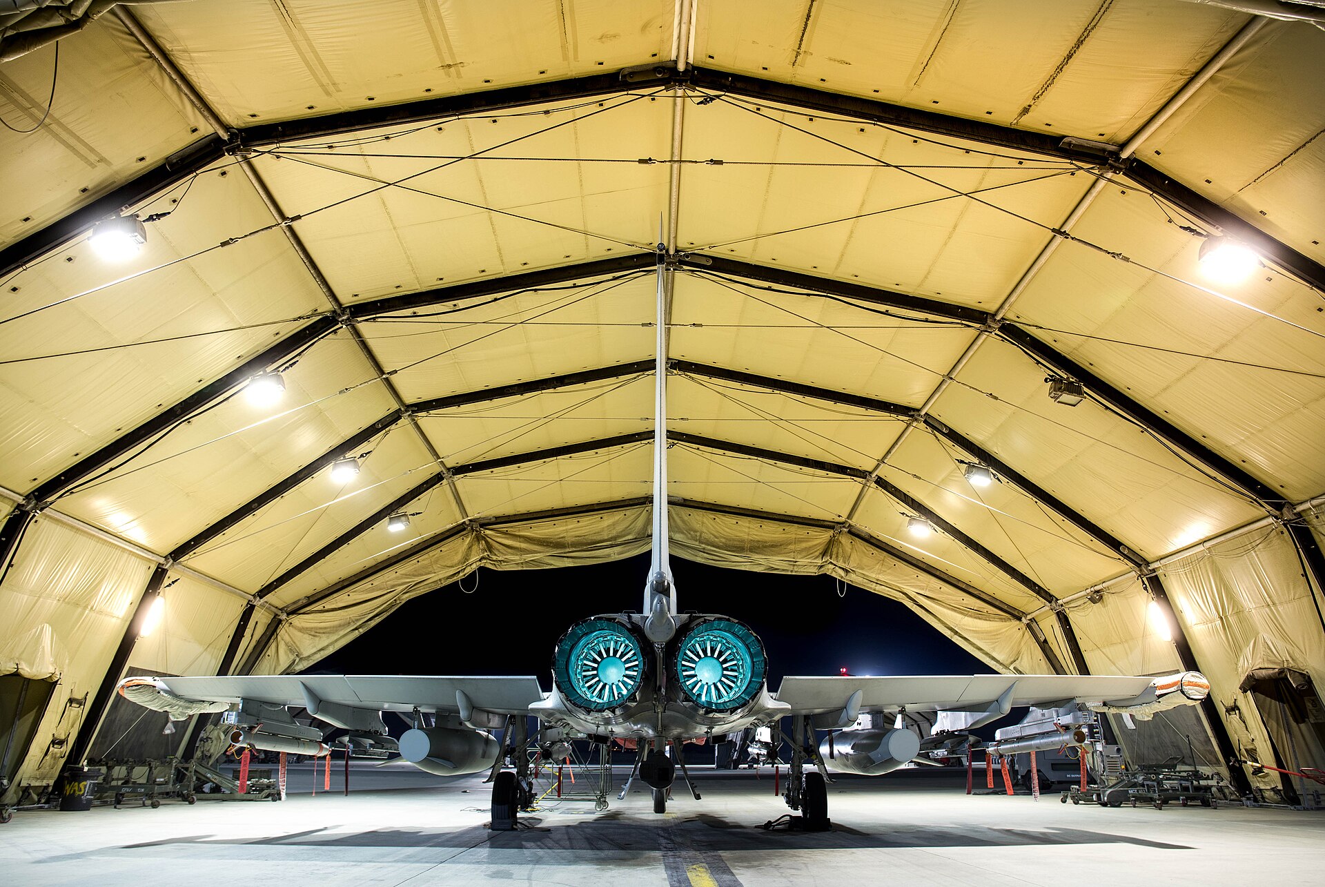 RAF Typhoon FGR4 armed and ready in a hardened aircraft shelter at RAF Akrotiri, Cyprus, at night — the base from which Britain’s Gulf air defence missions operate