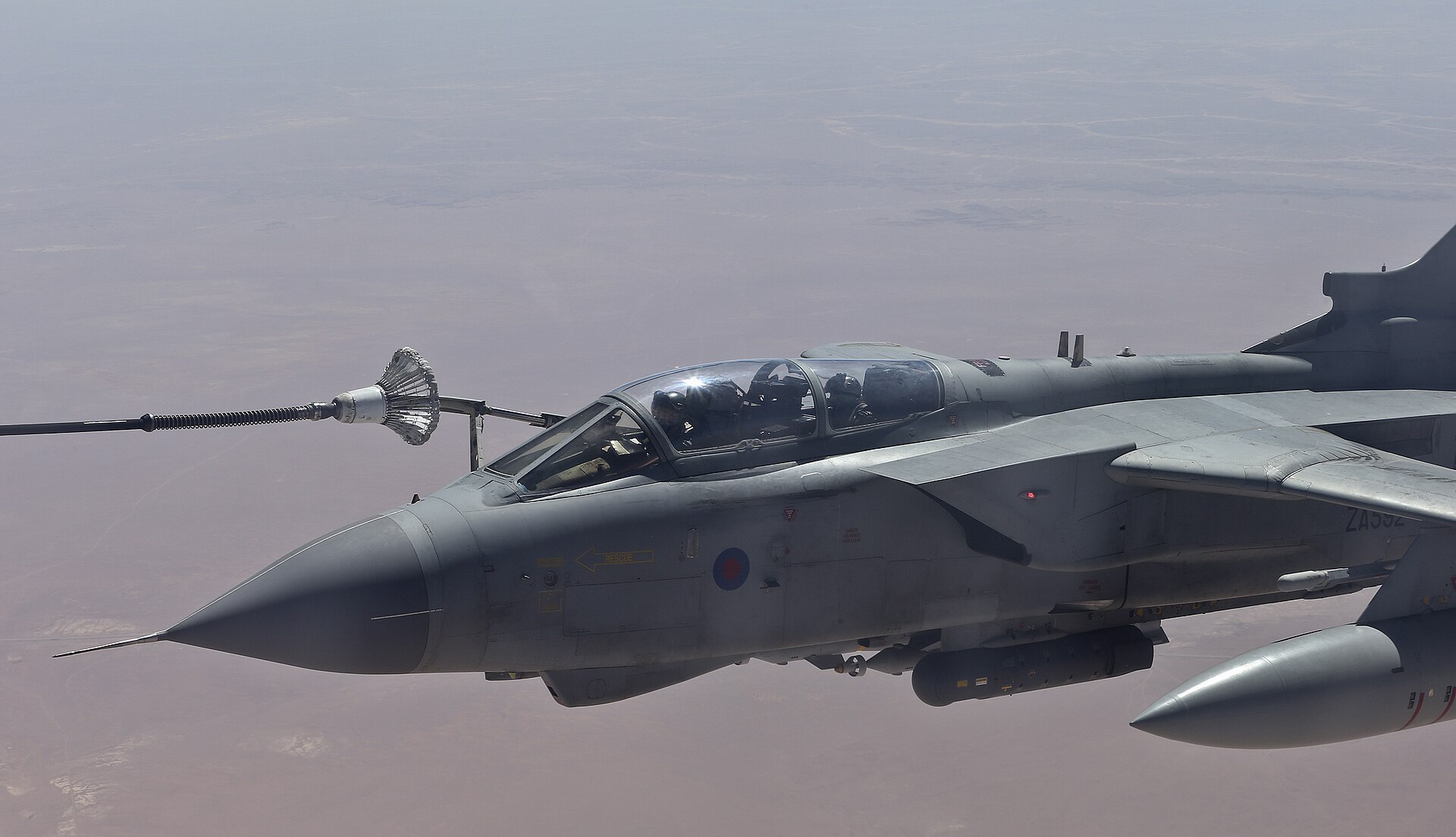 An RAF Tornado GR4 receives fuel from a Voyager tanker during Operation Shader — the same air-to-air refuelling capability Britain deployed from RAF Akrotiri to support Saudi Arabia from September 2026