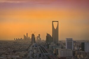 Riyadh skyline showing the King Abdullah Financial District (KAFD) towers and Kingdom Tower at dusk