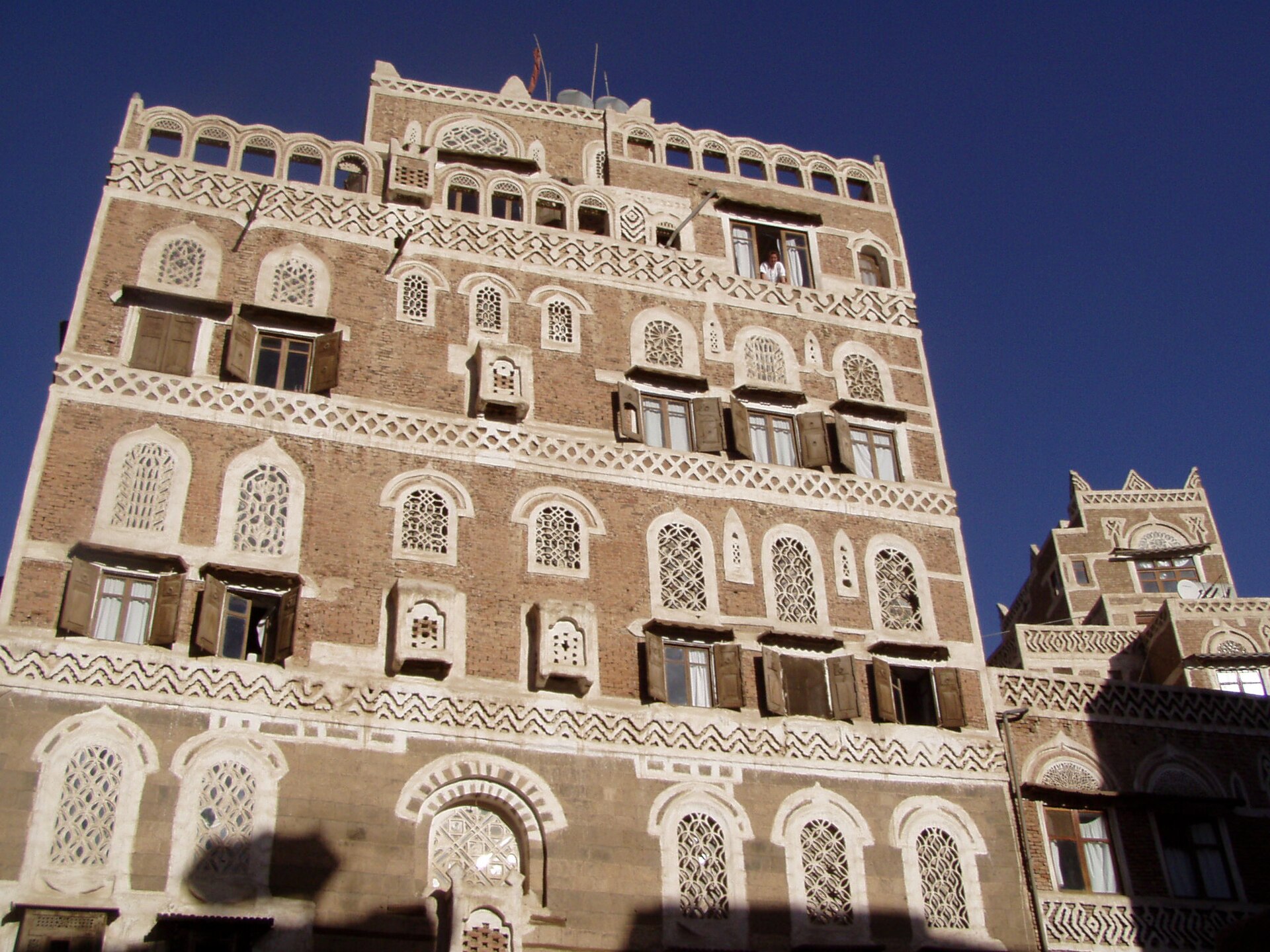 Traditional tower houses of Old Sana'a, Yemen — the city whose airport the Houthis demand be fully reopened as a precondition for ceasefire talks
