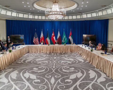 US Secretary of State Blinken meets with GCC foreign ministers including Saudi Arabia at UNGA 76 in 2021, with US and Gulf states flags displayed