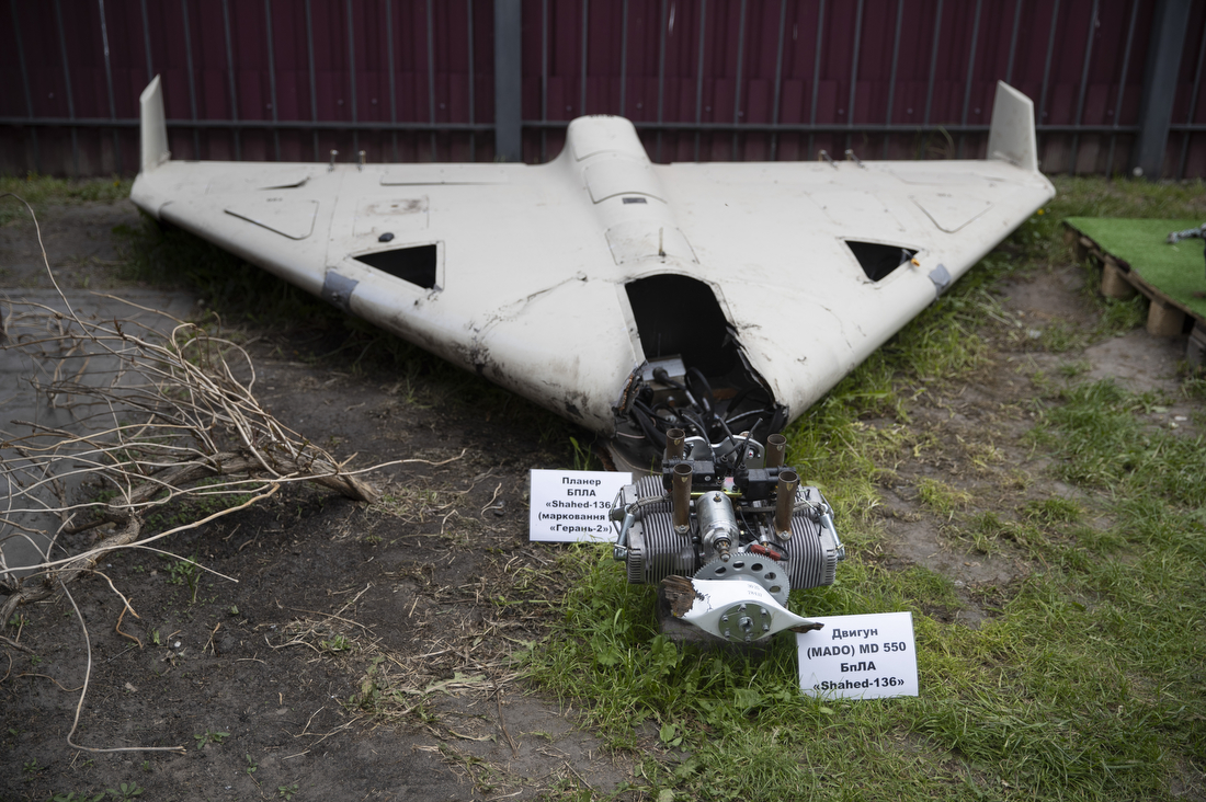 Remains of an Iranian-made Shahed-136 drone, labelled with its Russian designation Geran-2, displayed at the Kyiv Scientific Research Institute of Forensic Expertise in May 2023. Iran began supplying Shahed drones to Russia in 2022 and later transferred production tooling; the same intelligence supply chain now runs in reverse toward Yemen. Photo: Kyiv City State Administration / CC BY 4.0
