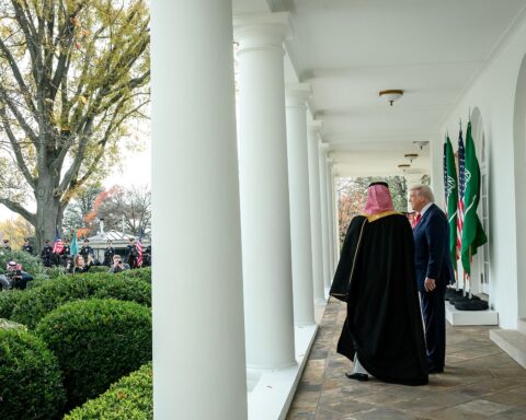 Donald Trump and Crown Prince Mohammed bin Salman walk together at the White House colonnade during their November 2025 bilateral meeting