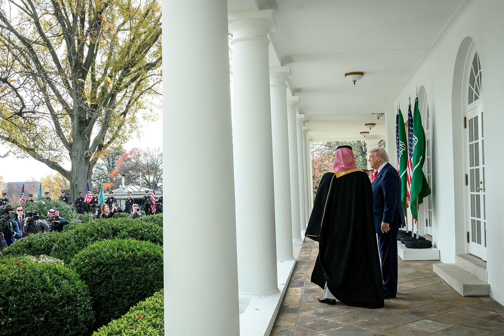 Donald Trump and Crown Prince Mohammed bin Salman walk together at the White House colonnade during their November 2025 bilateral meeting