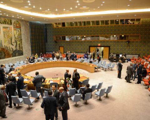 UN Security Council chamber with all 15 member seats visible during a formal session at United Nations headquarters in New York