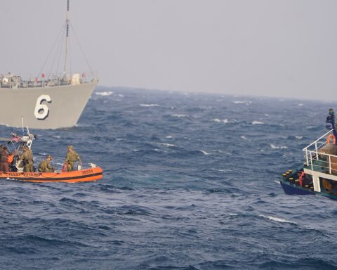 US Coast Guard RHIB from USCGC Clarence Sutphin Jr approaches a vessel during an arms interdiction operation in the Arabian Sea