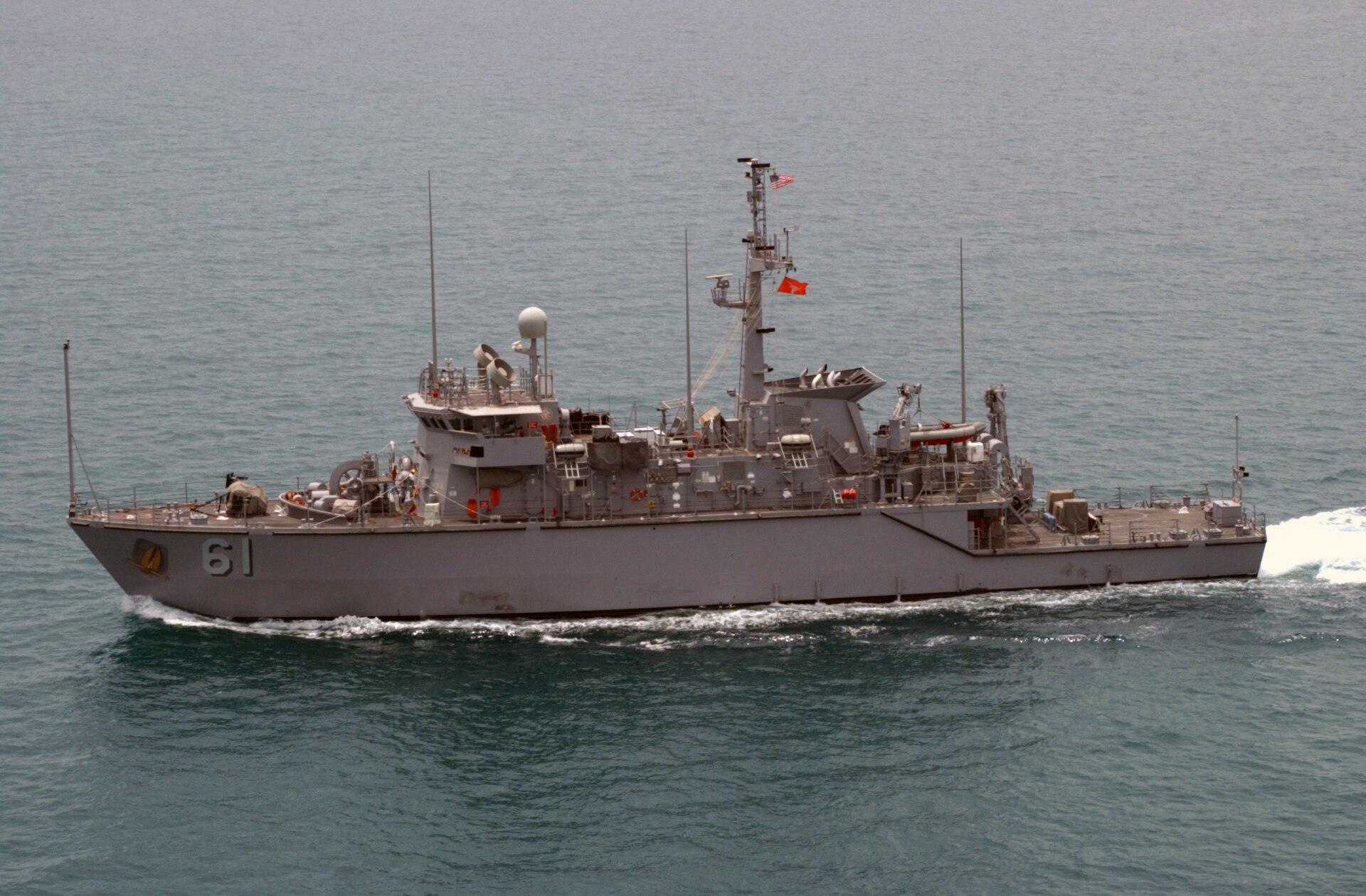 USS Raven (MHC 61), a US Navy mine warfare ship, underway in the North Arabian Gulf adjacent to the Strait of Hormuz