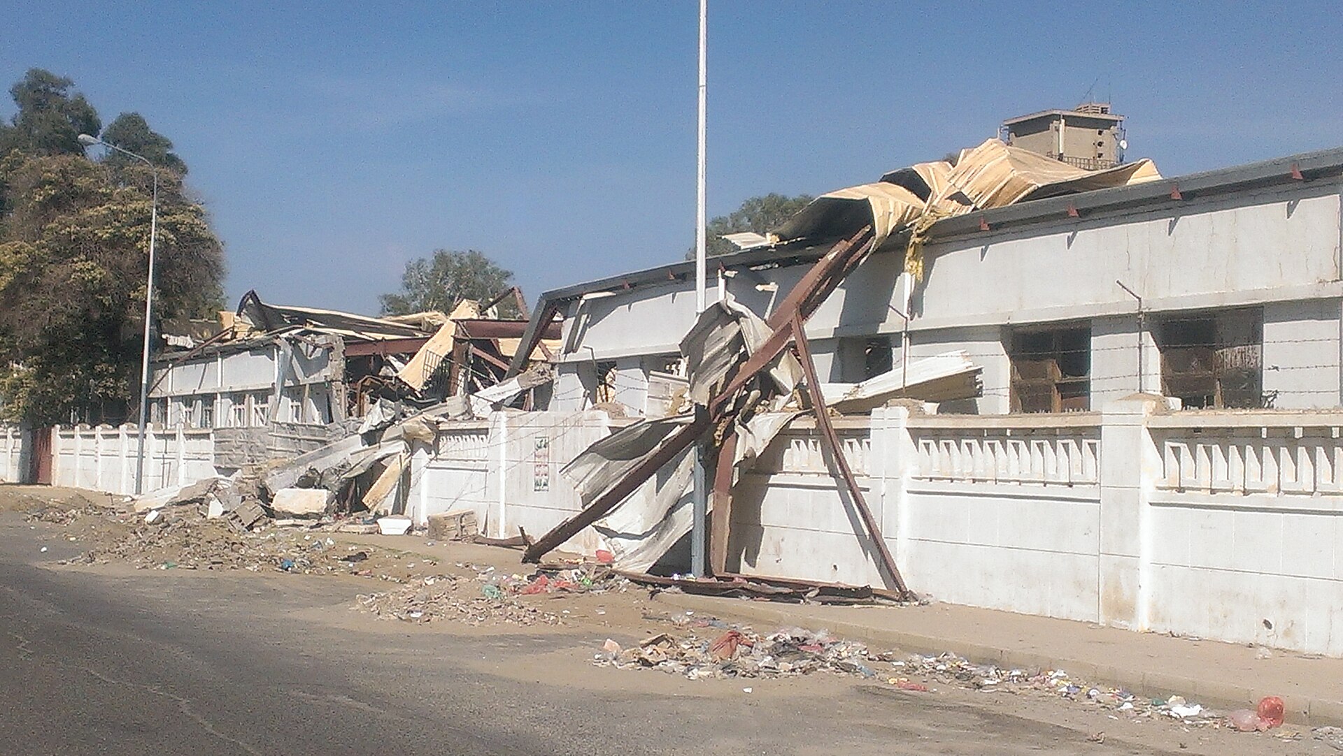 A bombed industrial building in Sana'a, Yemen, November 2015 — one of more than 1,300 civilian workers left unemployed after a coalition airstrike destroyed the textile factory